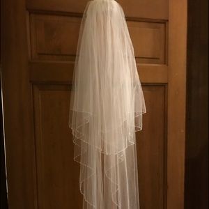 Beautiful 2 tier veil with beaded trim